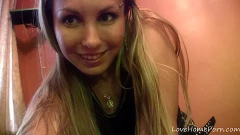 Blonde babe plays with her big tits