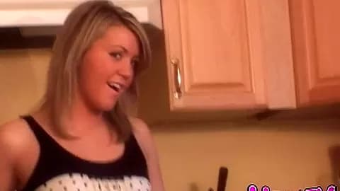 Horny blonde masturbating on the kitchen floor in POV